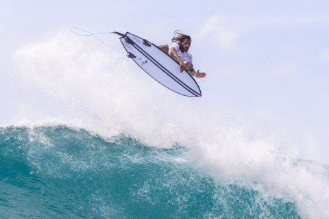 Surfer does Air with Torq Shortboard